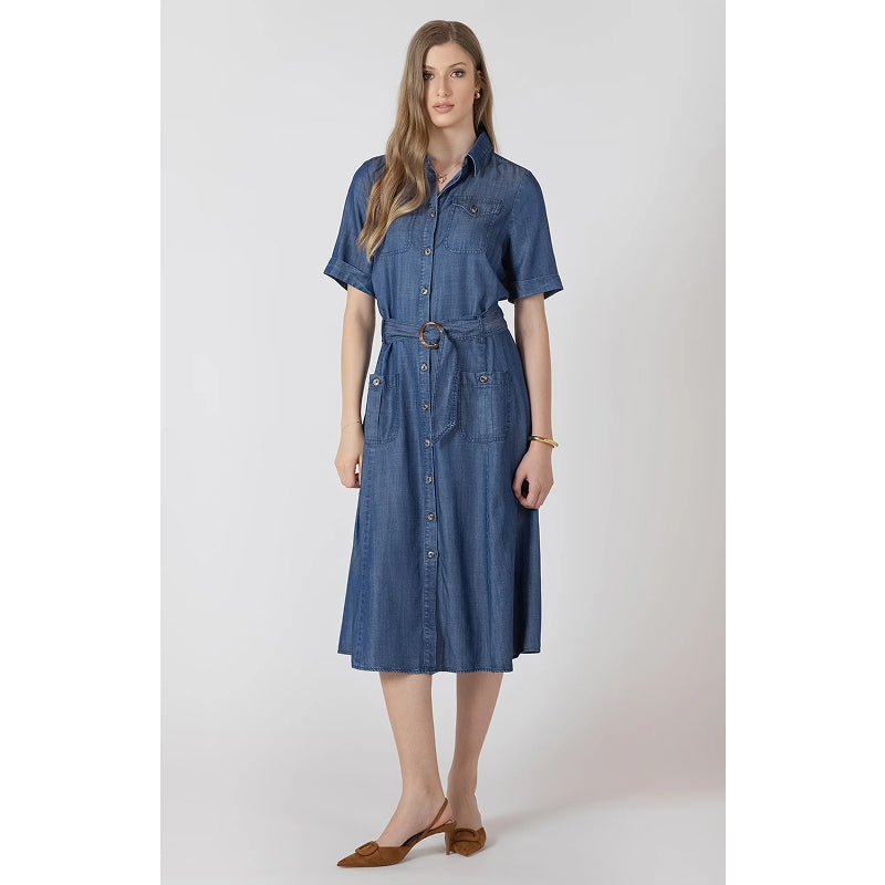 Woman wearing a blue denim dress on a white background
